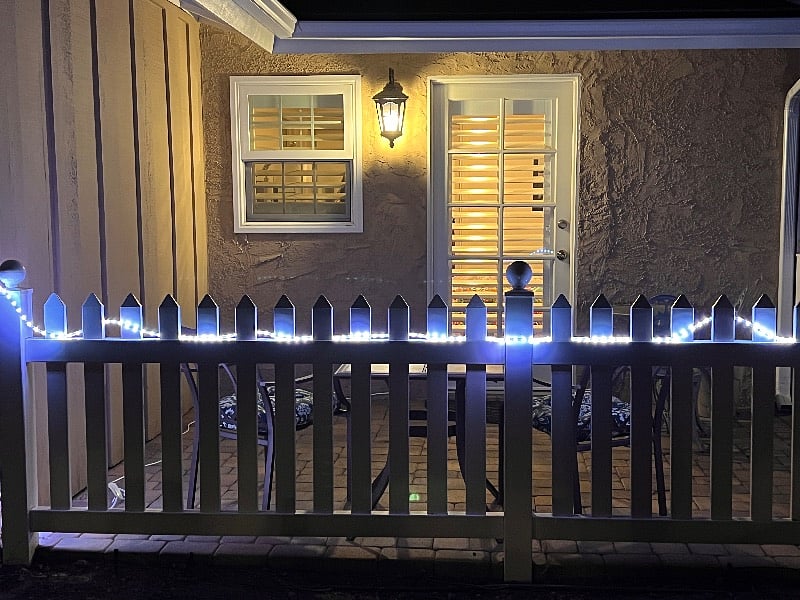 Private entrance and patio at night