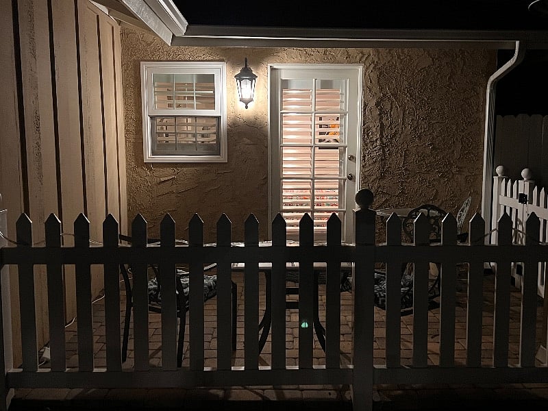 Private entrance and patio at night