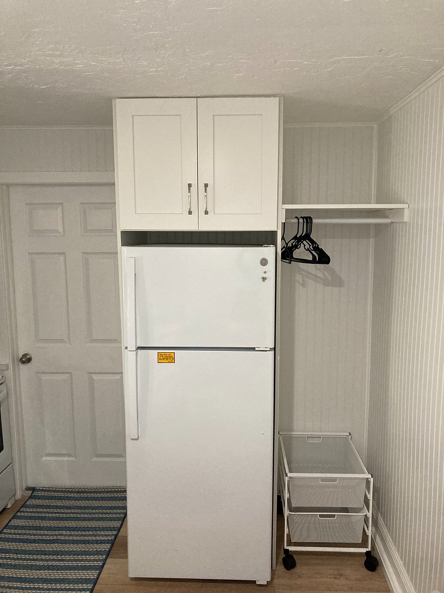 Backdoor (through shop), frig & closet area