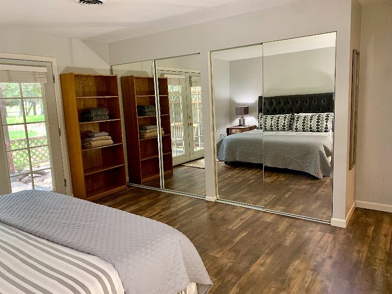 Large double door mirrored closets, tons of space. Shelving inside for organizing til your heart's content. Also large dresser (not pictured).