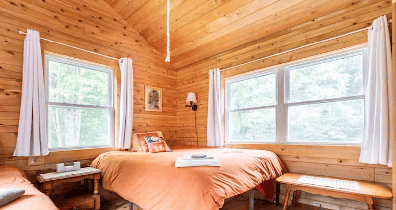 Queen bed in larger bedroom