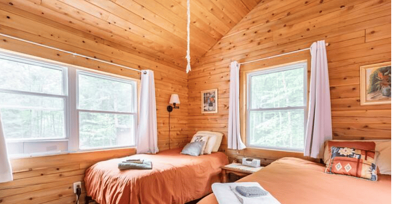 Twin bed in larger bedroom
