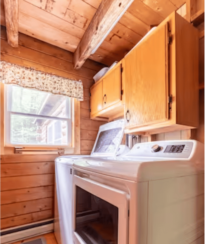 Laundry room with full size washer and dryer.