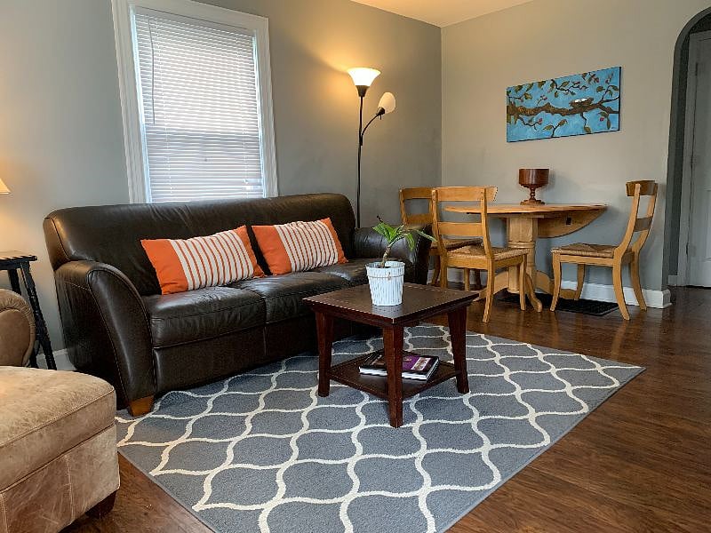 Comfy leather sofa, leather chair and dining table