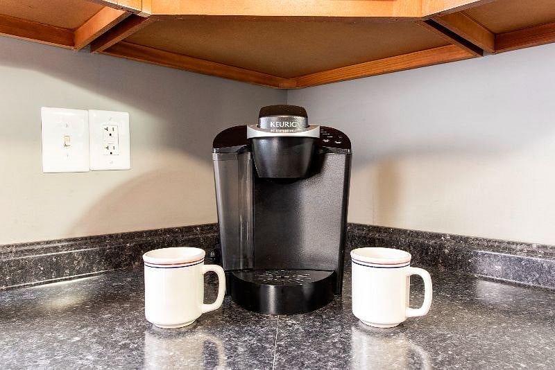 Both a Keurig coffee maker and a regular coffee pot are available for guests