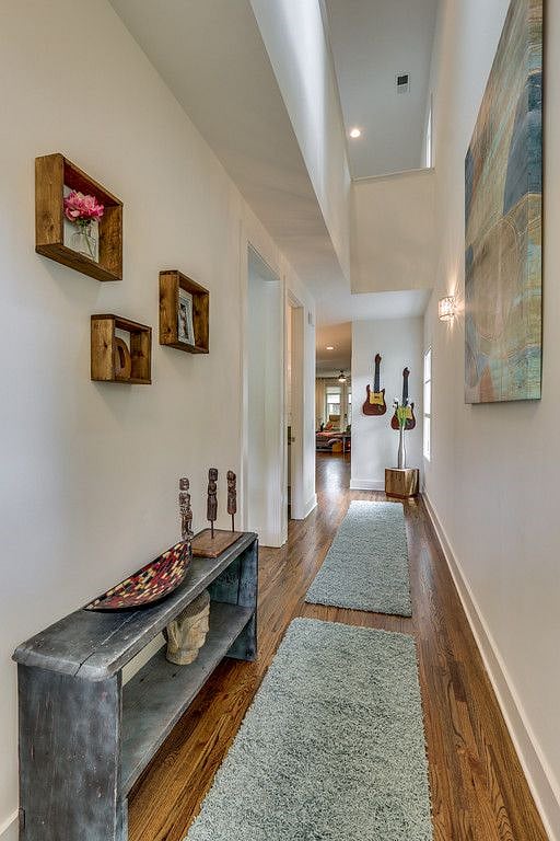 Beautiful welcoming entry way into our home with a rustic feel and 30 foot ceilings 