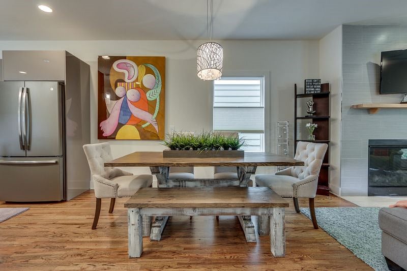 Custom made Rusticated Farm House Table with Bench and comfortable Linen Chairs. 