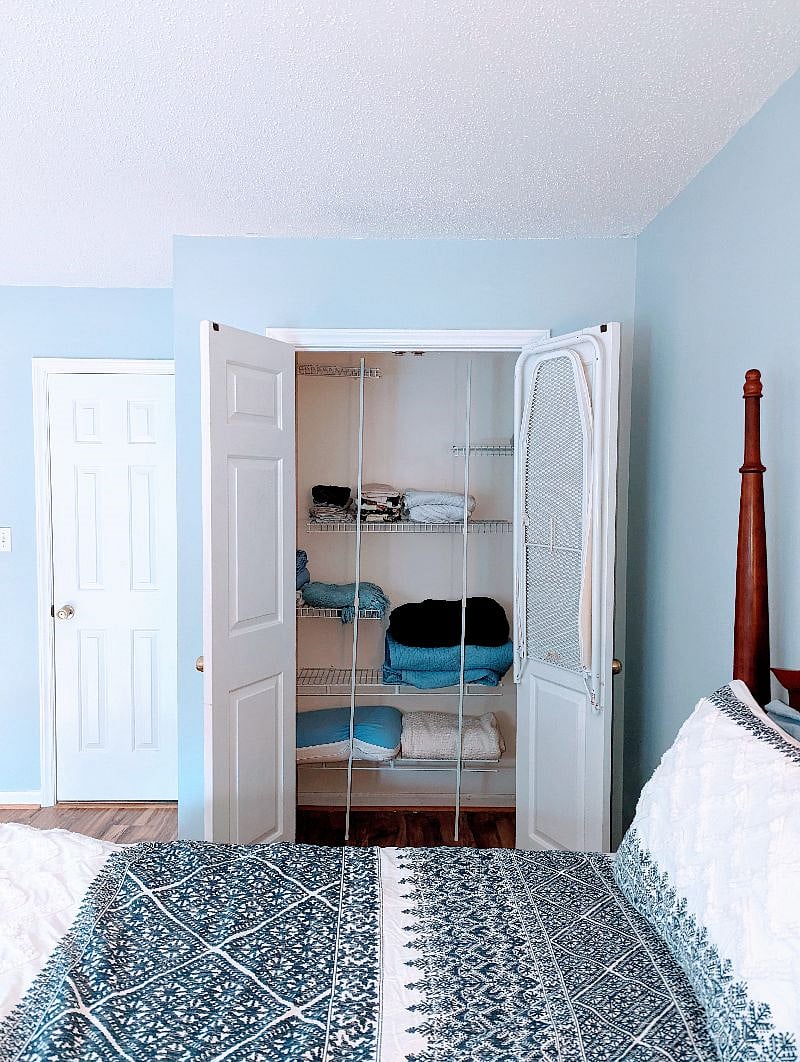 Ample closet space with drop down iron board. 2 closets total in bedroom.