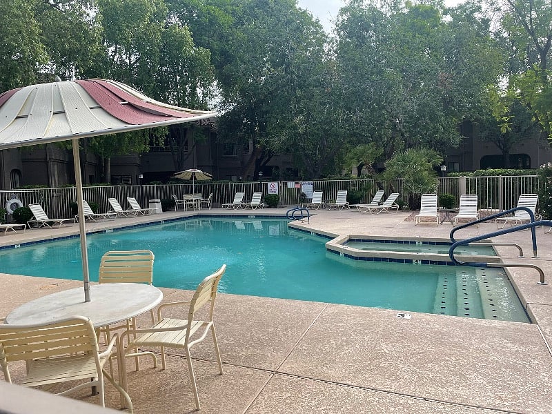 One of 5 heated swimming pools on property . Each has jaquizzi too.