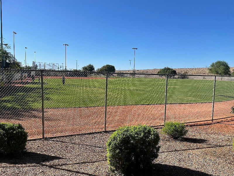 Sports complex is well lite and opened all day and evenings.. right in back of complex.. but far enough you do not hear any noise at all.