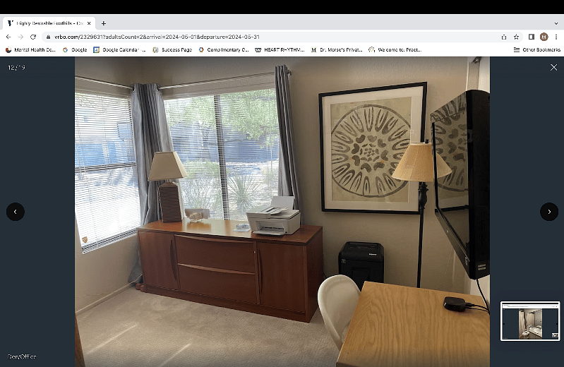 Office with work station including TV / Monitor and a full size Murphey Bed