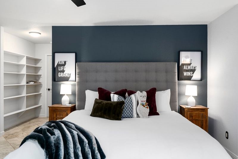 Master Bedroom with King Bed, Walk-in Closet, TV, and attached bathroom