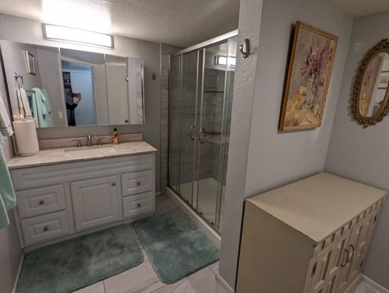 Large Walkin Shower and Granite Vanity Countertop