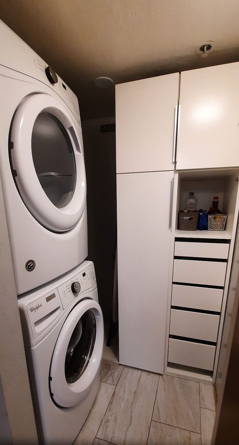 Pantry and Full Size Washer and Dryer In Unit
