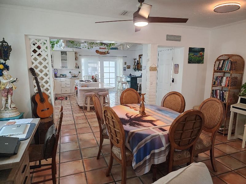 Dining room with desk, guitar and piano!