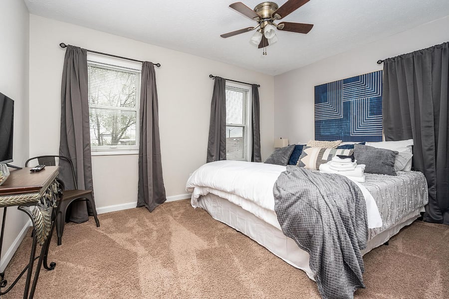 Unit B 2nd floor King bed with private hallway bathroom with double sinks, jetted tub/shower combo