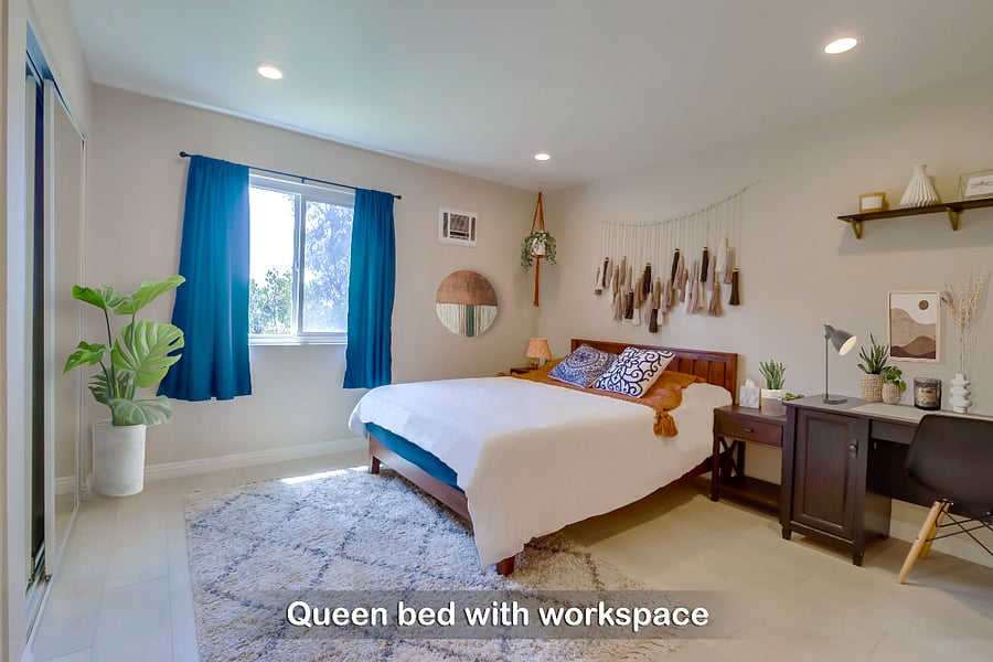Recharge in this cloud-like queen bed in Bedroom 2 w/ a nearby workspace