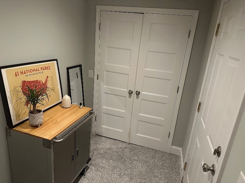 Entry way with a large storage closet for all your belongings and a full length mirror to make sure you are ready for the day/ night.