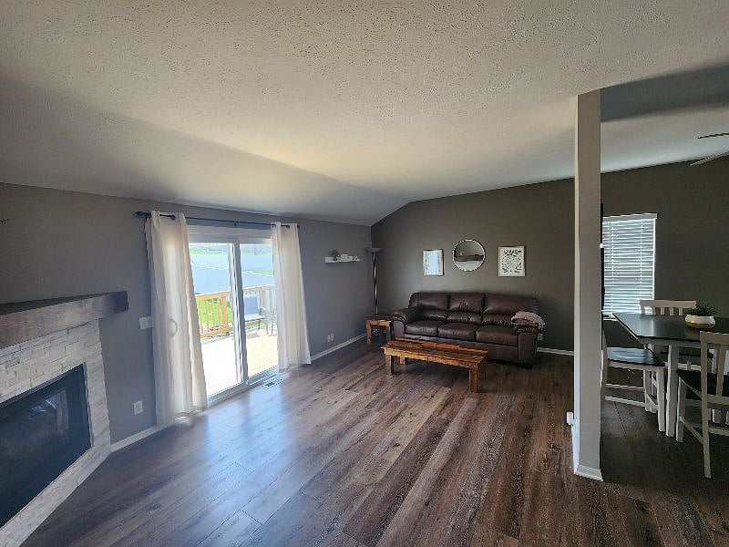 Living space with patio door to the deck.