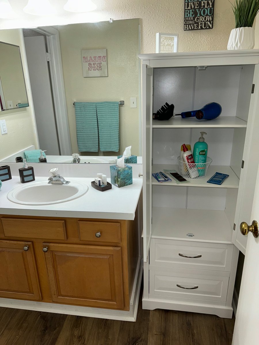 2nd bathroom dressing area with separate locking doors from tub/shower & toilet. 