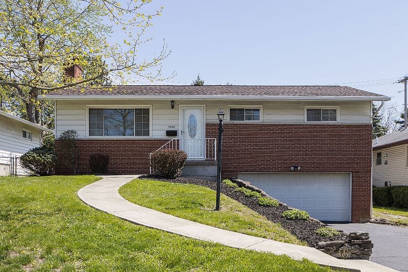 Concrete walkways make it easy to access front and side entrances.