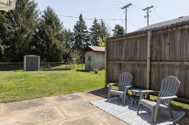 Private patio area with seating.