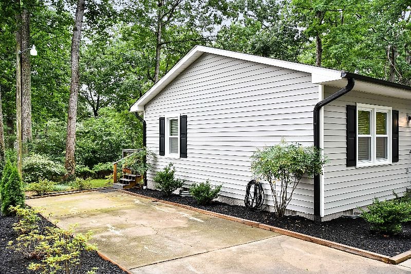 Driveway on left side of home