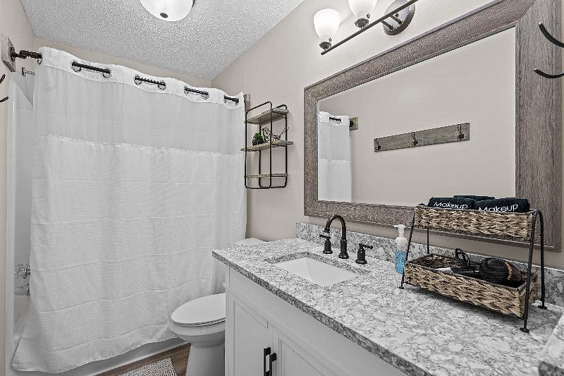 Hall bathroom--Cambria Quartz countertop. Full size tub/shower.