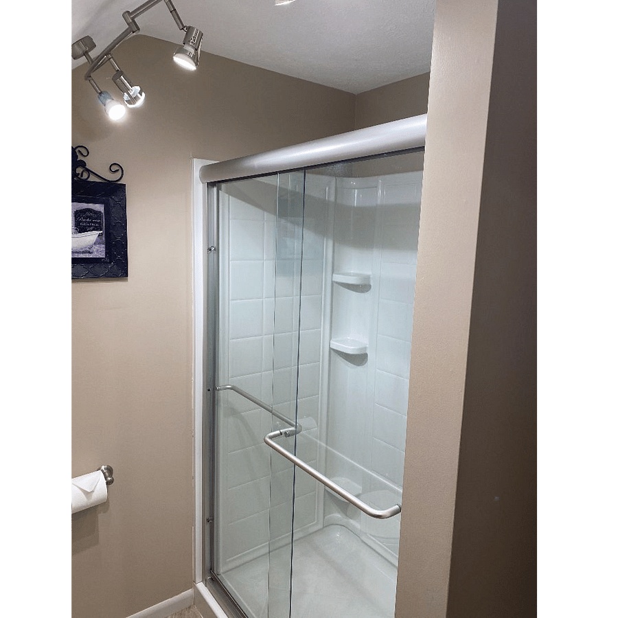 Nice sized shower with plenty of shelf space.