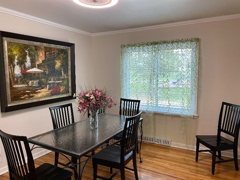 Shared dining room with a view of back yard.