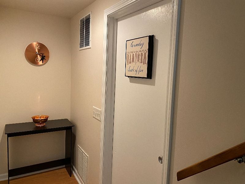 Entrance to the laundry room.  Washer, dryer, wash sink, full sized ironing board, steamer and laundry supplies provided.