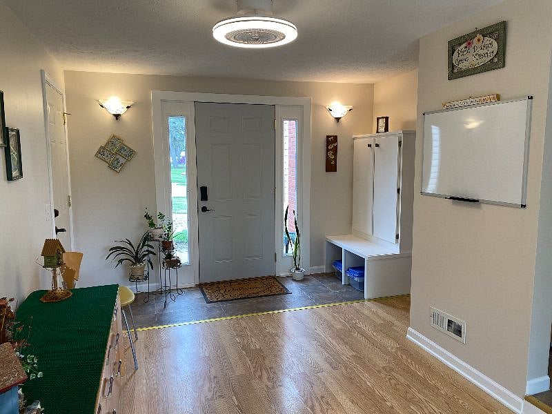 Shared breezeway that serves as a spacious foyer for the front and back door.

