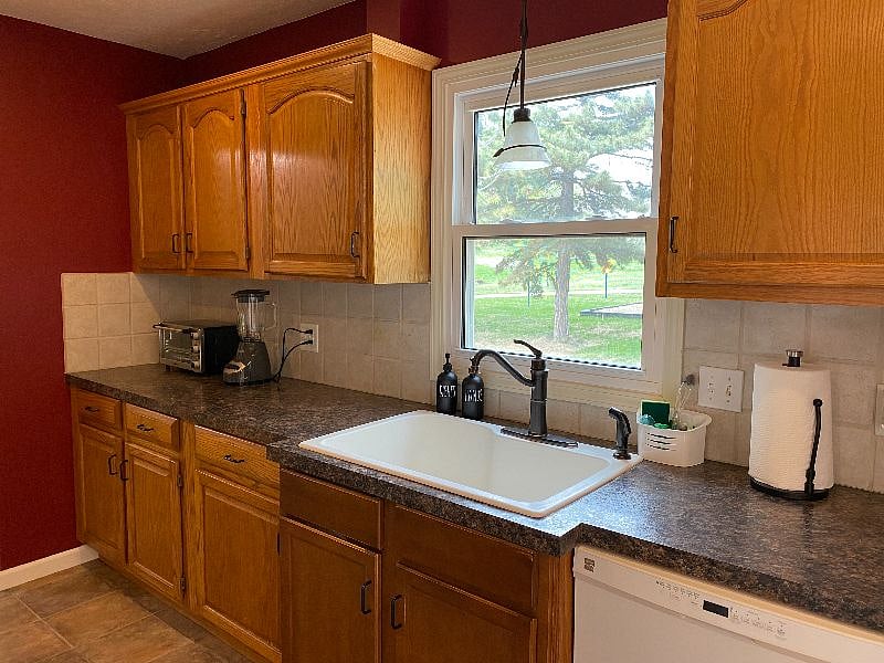 Shared kitchen with a restful view of back yard.  All hand and dish soap provided.  Tenants  clean up after themselves, but weekly housekeeping of breezeway, kitchen, and living/dining room is provided.