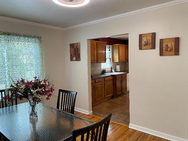 Shared dining room with a view of the shared kitchen.  You can always choose whether to eat here or in your private suite.