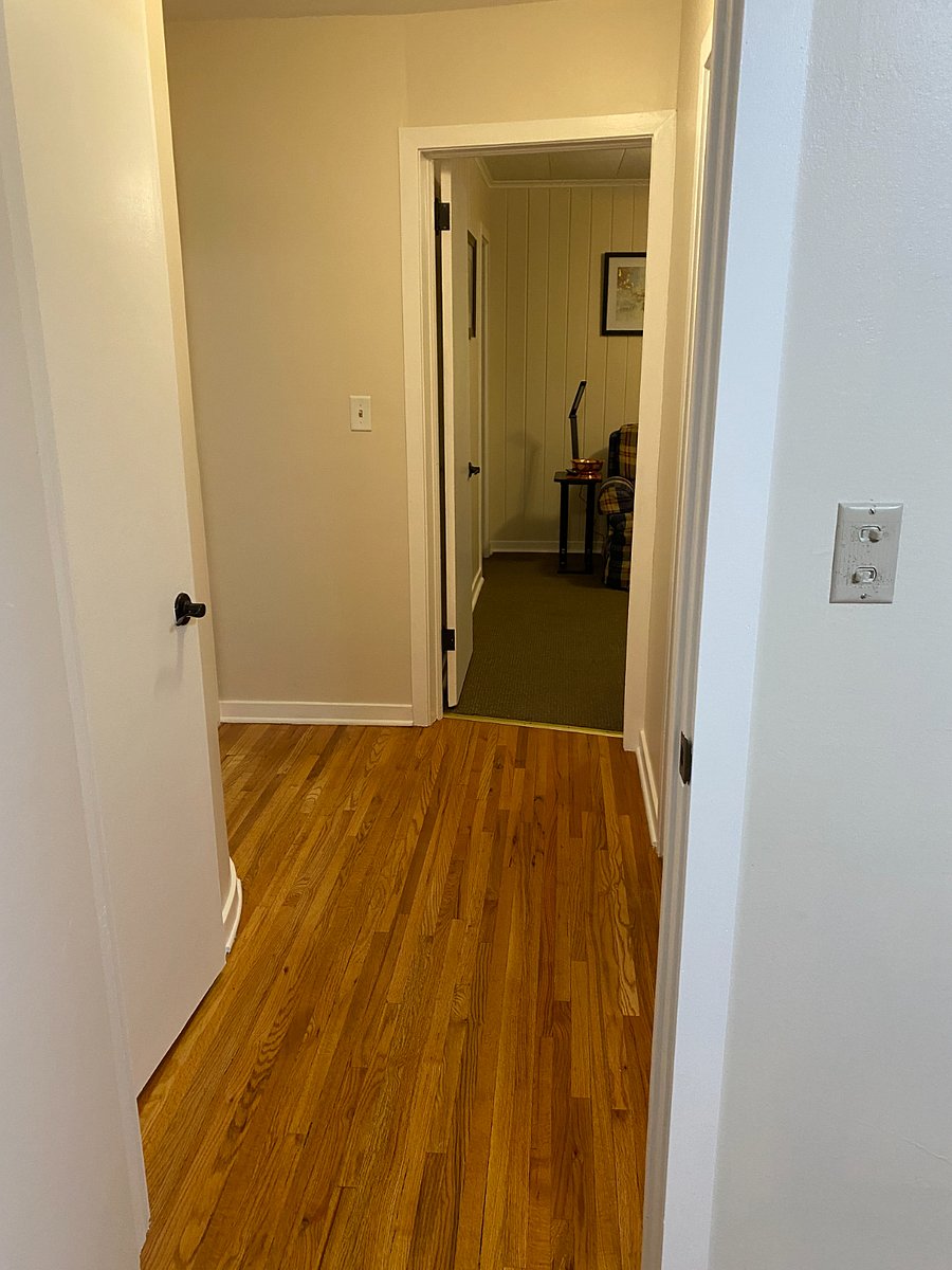 Private hallway within Suite 2 .  Hall closet at entrance to the Suite.