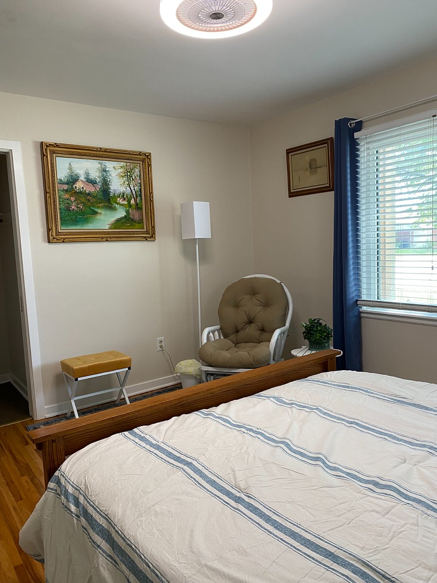 Comfy rocker and reading nook in the bedroom.