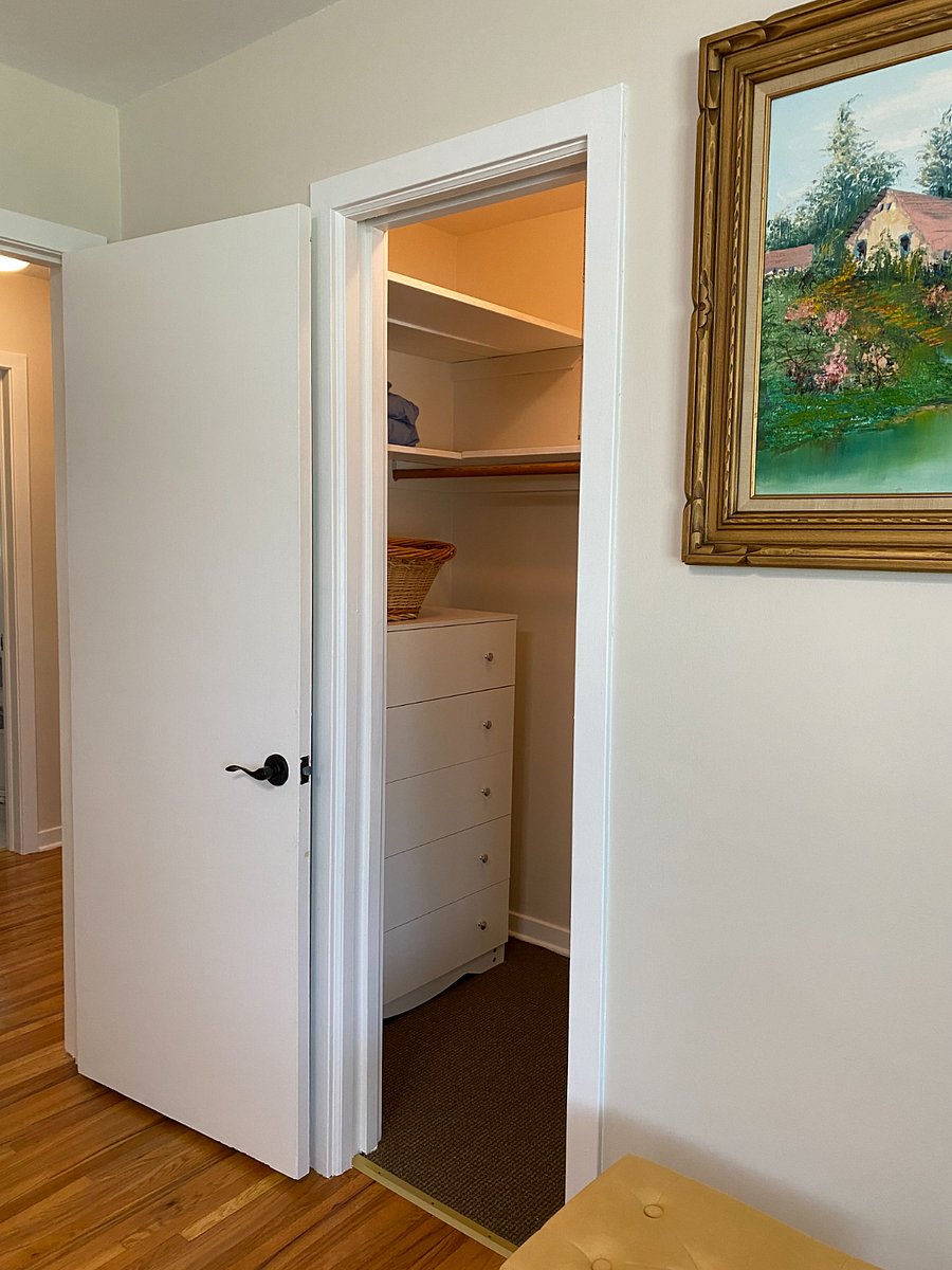 The second closet in Suite 2.  A chest of drawers and laundry basket are included.