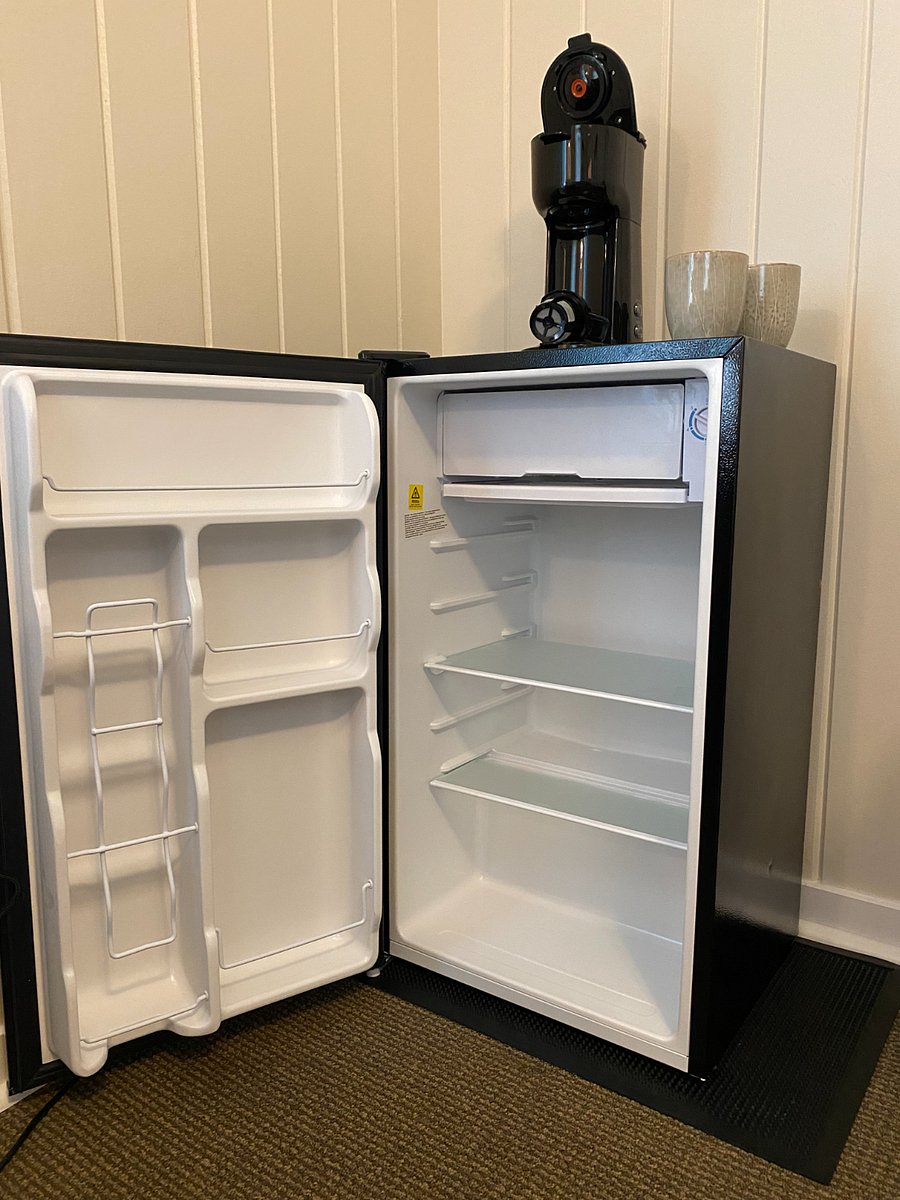 Small refrigerator in the Suite in addition to 1/2 of the full sized refrigerator in the home's kitchen.