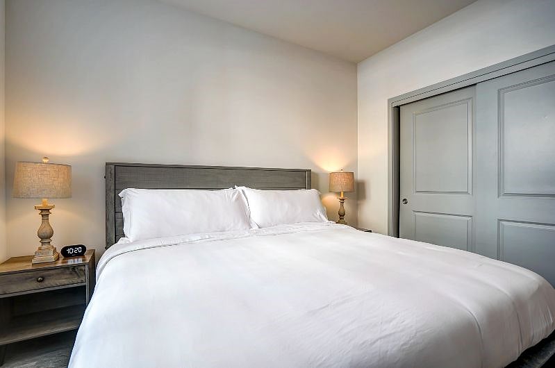 Dream the night away in our cozy bedroom with a king-size bed. 