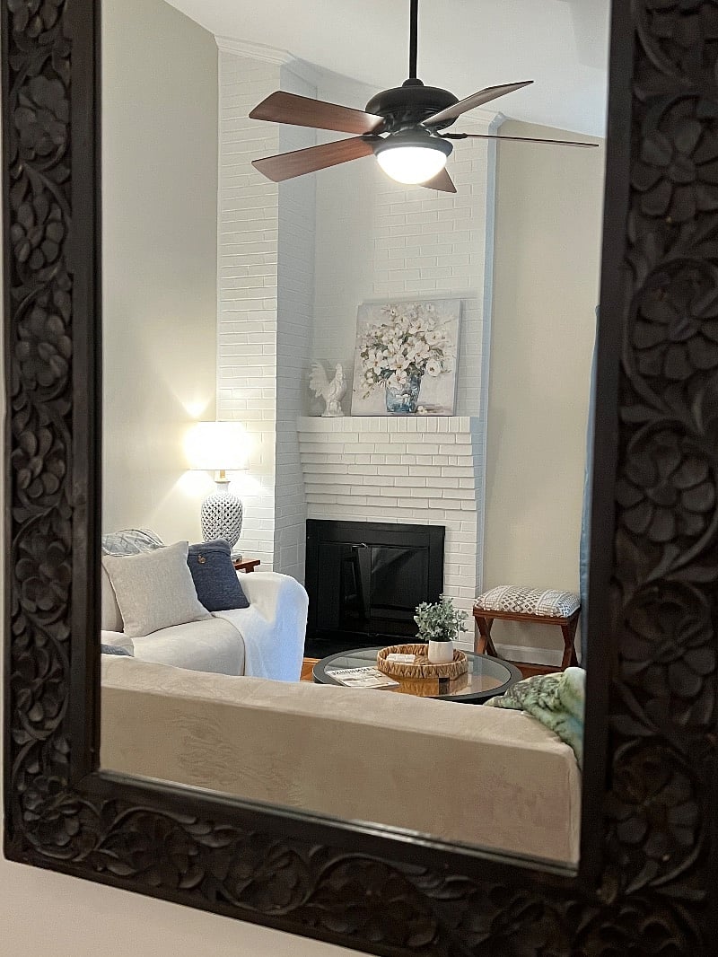 Reflection of living space from entryway mirror
