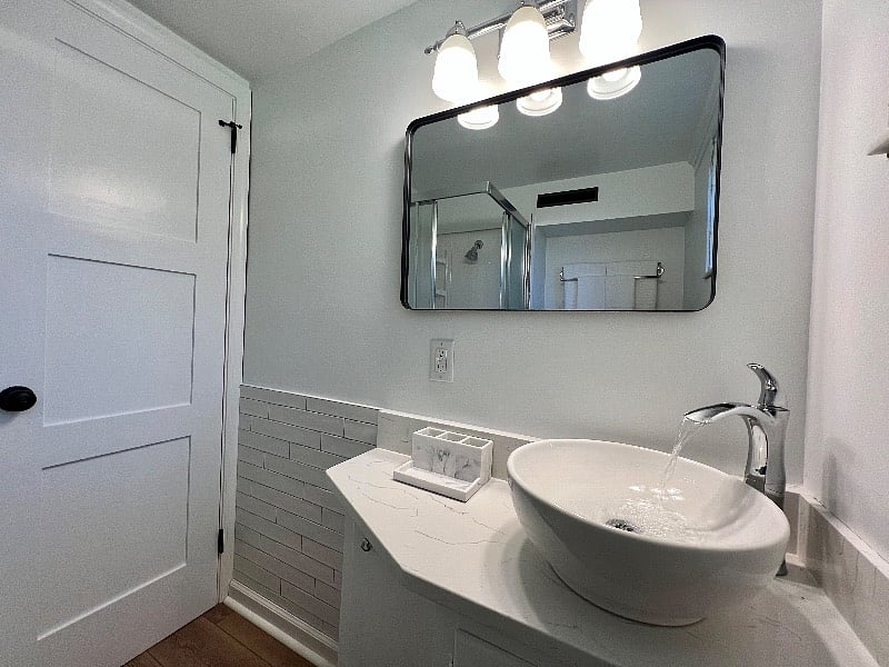 New door, hardware, fixtures, and mirror