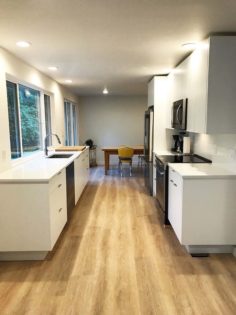 Freshly remodeled contemporary kitchen, open floor plan, new vinyl floors throughout