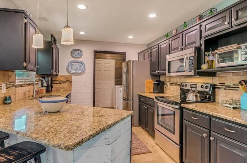 Spacious kitchen with complementary coffee and tea.