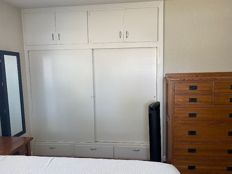 the system is clipping the images... there are also 3 big drawers below the main closet. The closet is 7' across and 3' deep. It is floor-to-ceiling. 
