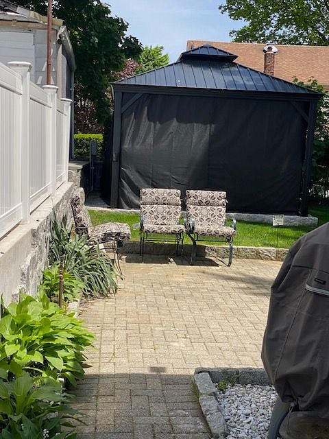 view of gazebo with bug screen