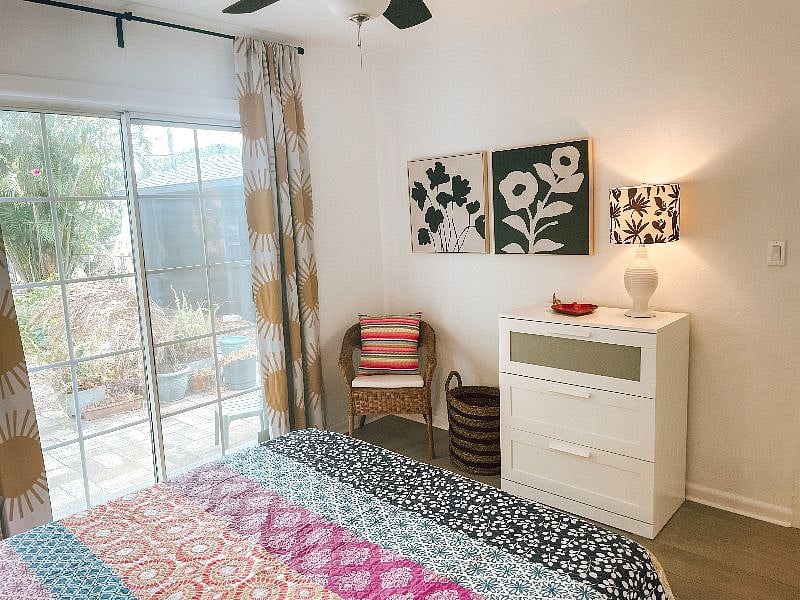 Queen bedroom includes Casper mattress, room darkening shades and drapes, sound machine, and sliding doors to backyard.