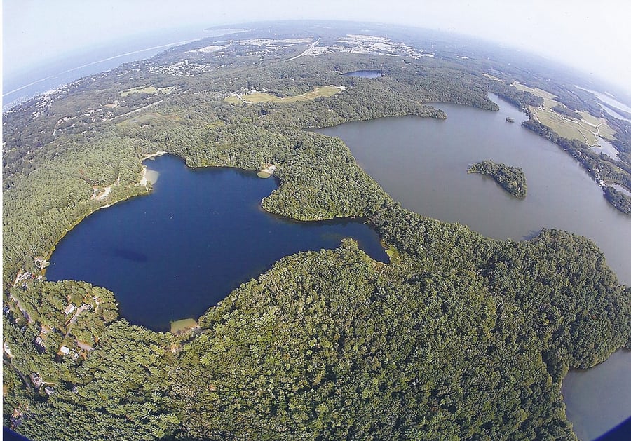 The blue pond on the left. A "kettle" pond, meaning spring fed. No algae.