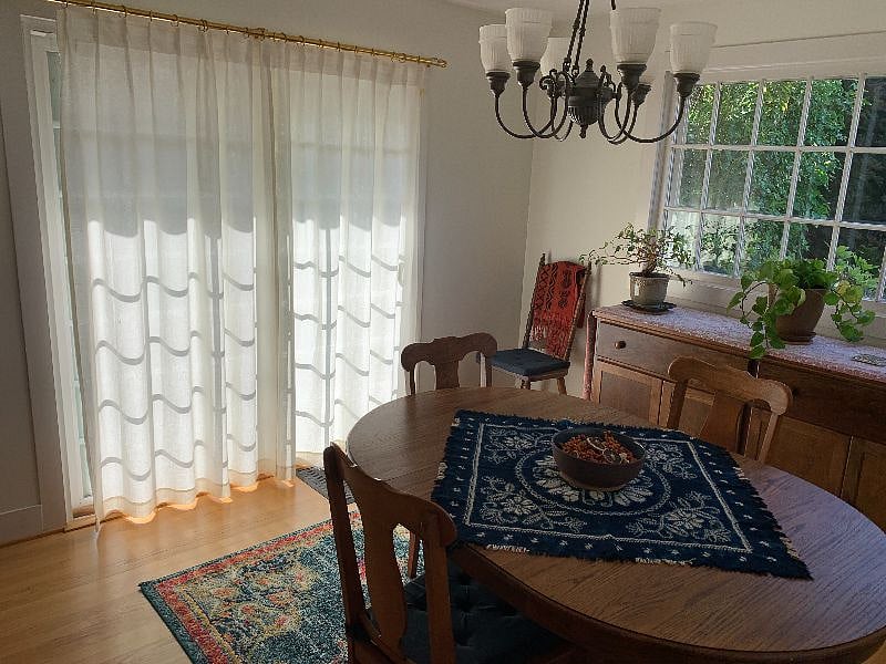 Dining room with sliding door.