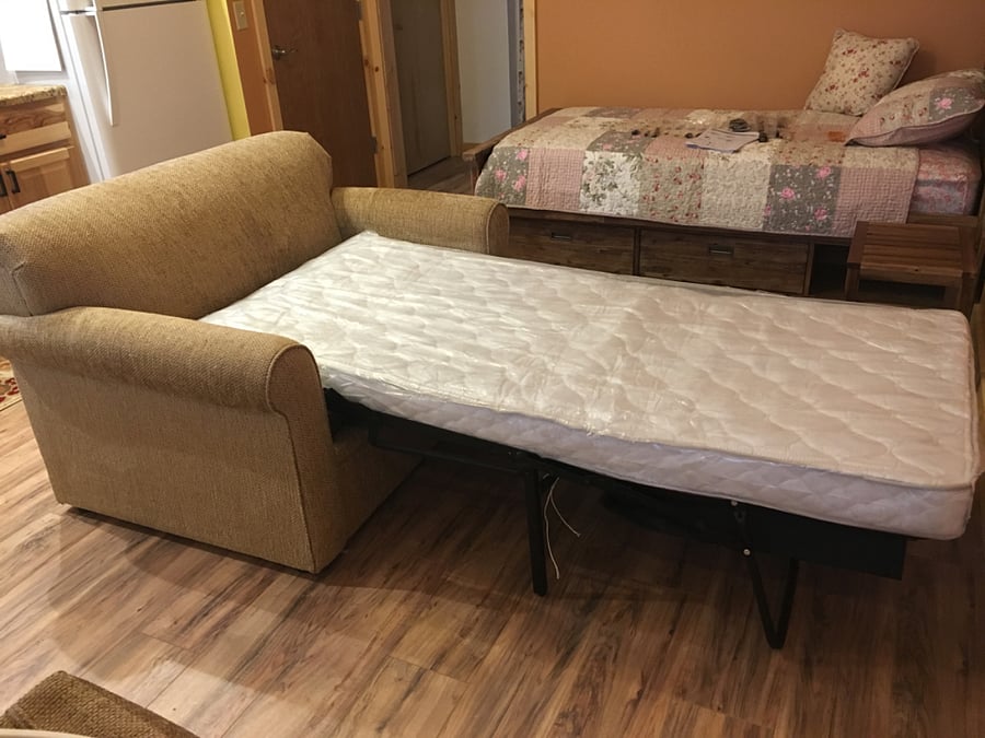 Loveseat pulls out to a single bed