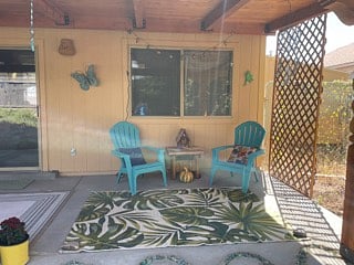 Back patio in private, fenced backyard.